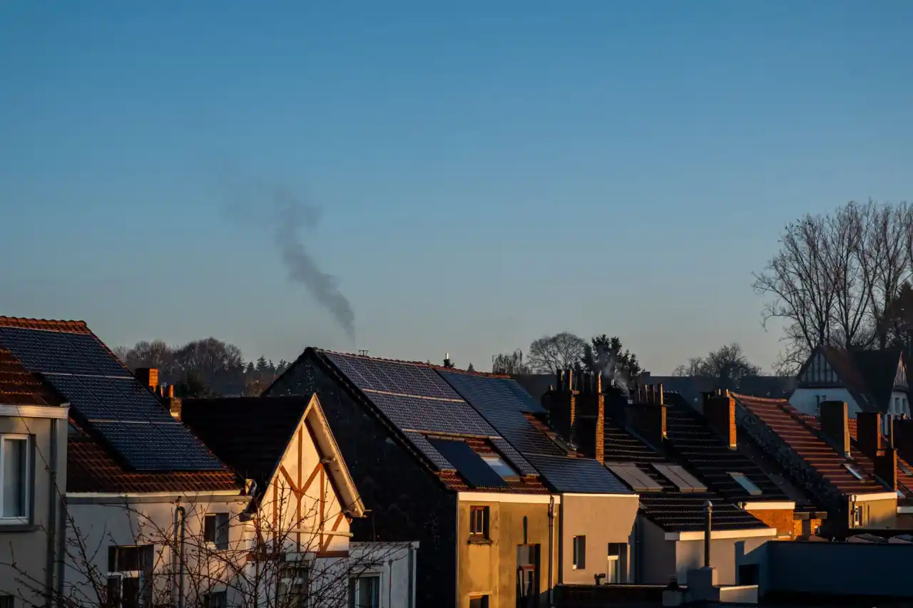 Residential neighborhood with multiple completed rooftop solar installations
